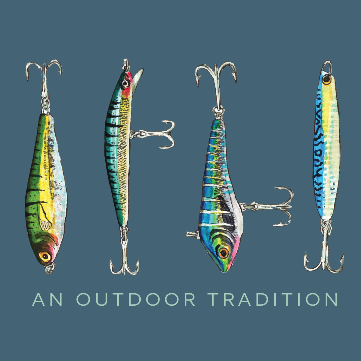 Four fishing lures displayed against a muted blue-gray t-shirt with the text 'AN OUTDOOR TRADITION' at the bottom. The lures are painted in realistic fish patterns with yellow, green, blue, silver, and red details.