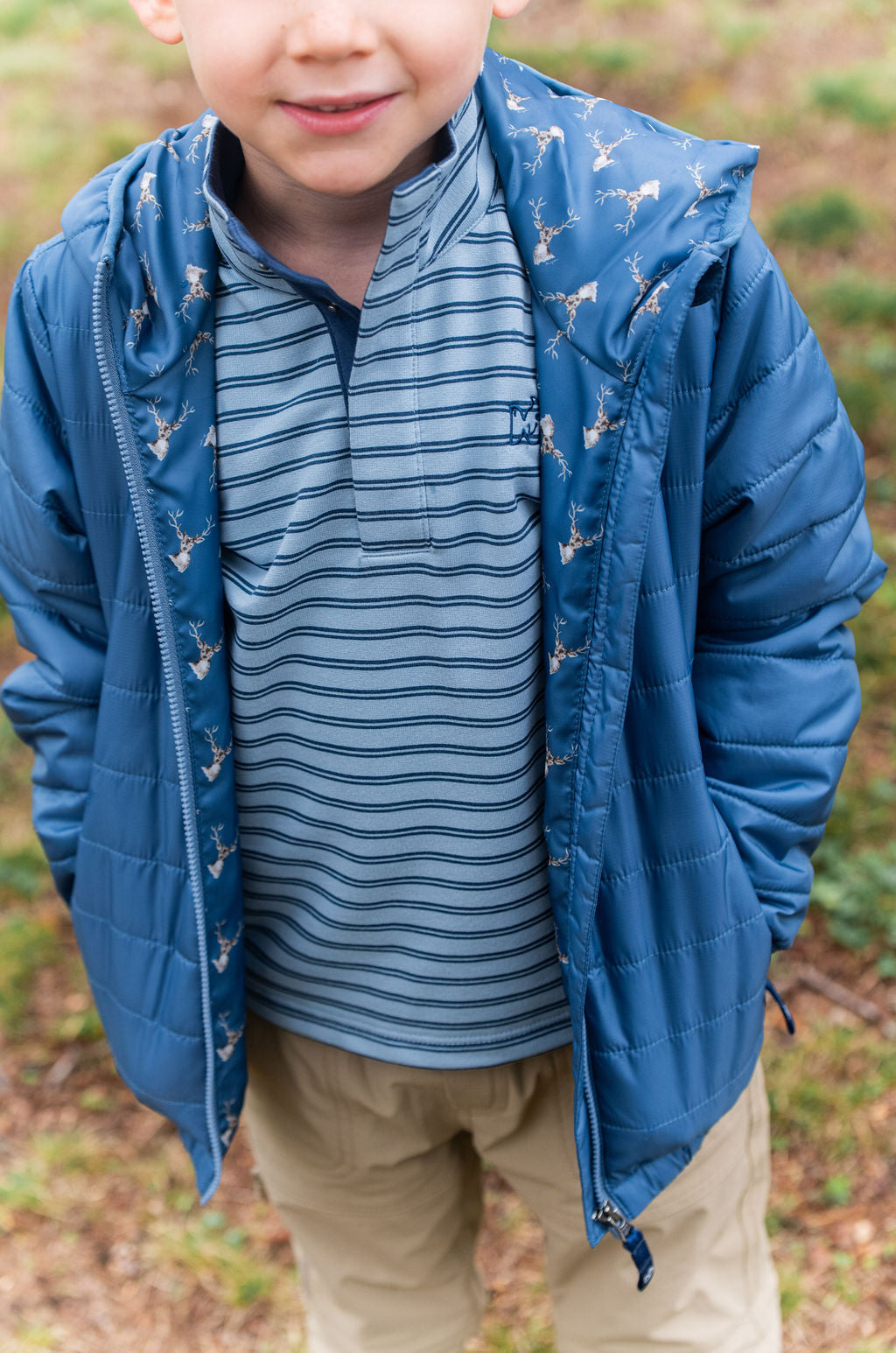 kids faded blue puffer jacket with hood and outdoorsman style liner