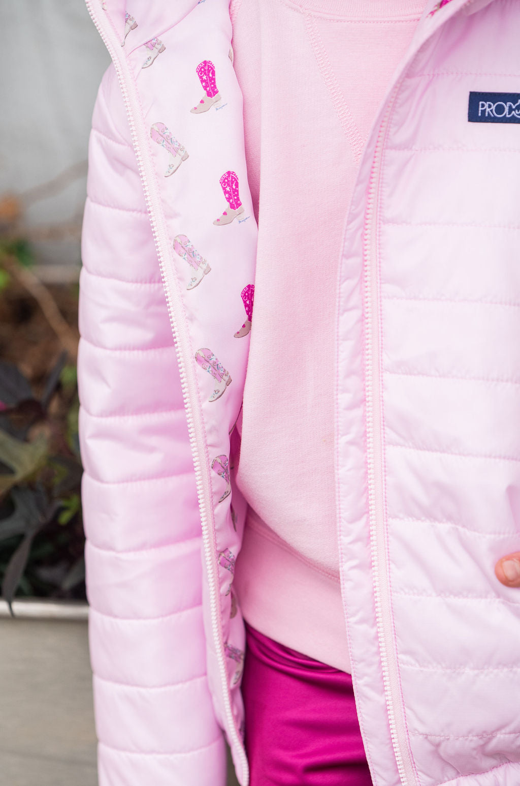 girls pink hooded puffer jacket with cowboy boot print liner