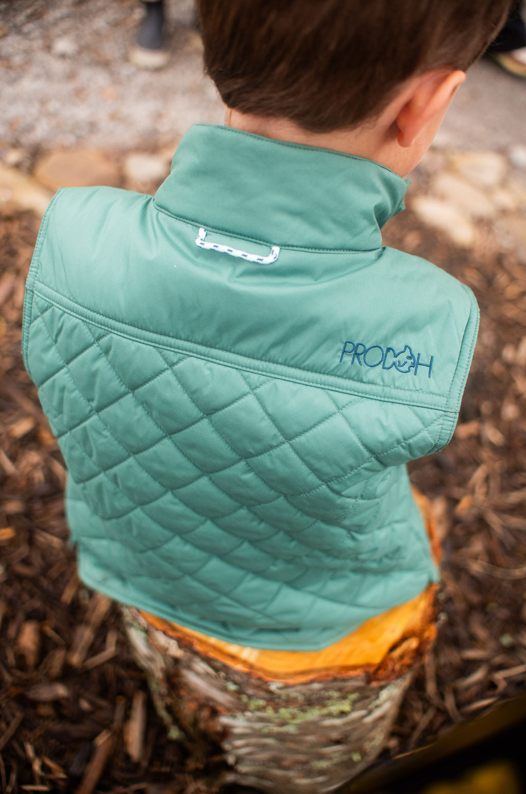 boys and girls quilted pattern vests in green