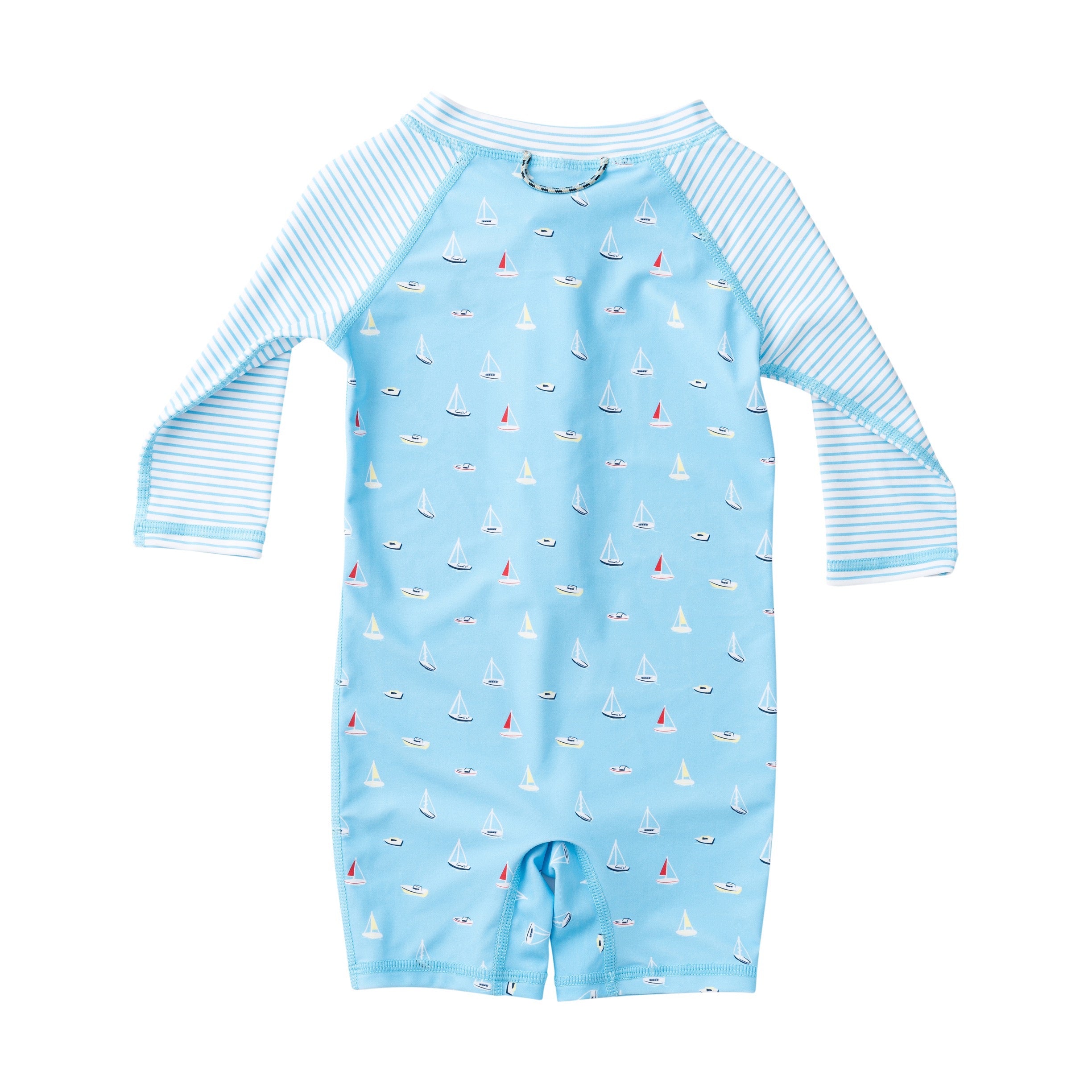 Blue baby and toddler swimsuit with sailboat pattern on a white background