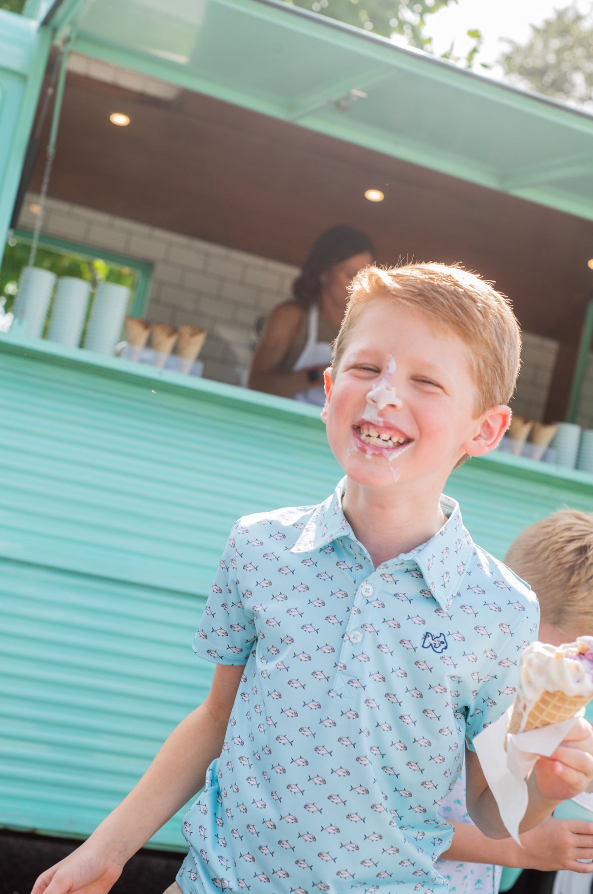 boy wearing moisture-wicking, quick-dry polo shirt for outdoor activity