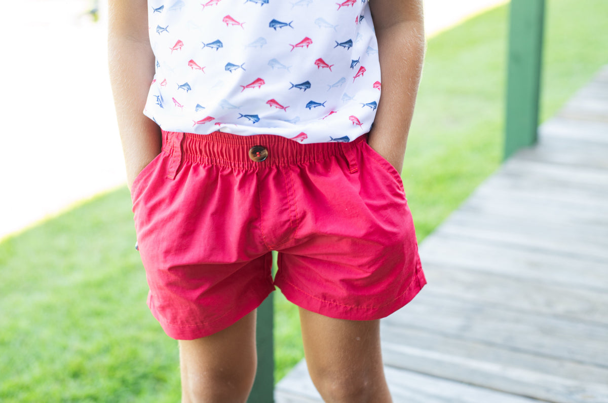boy wearing red Performance Shorts
