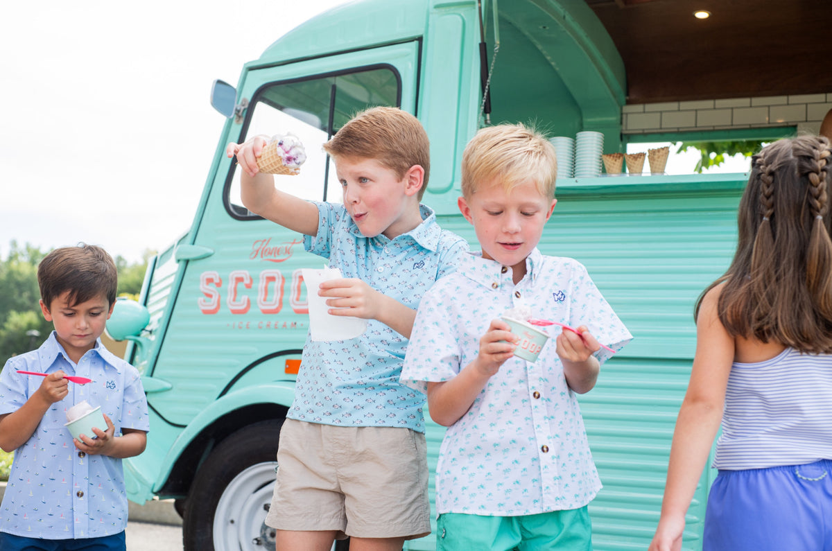 Children eating ice cream in khaki shorts by prodoh